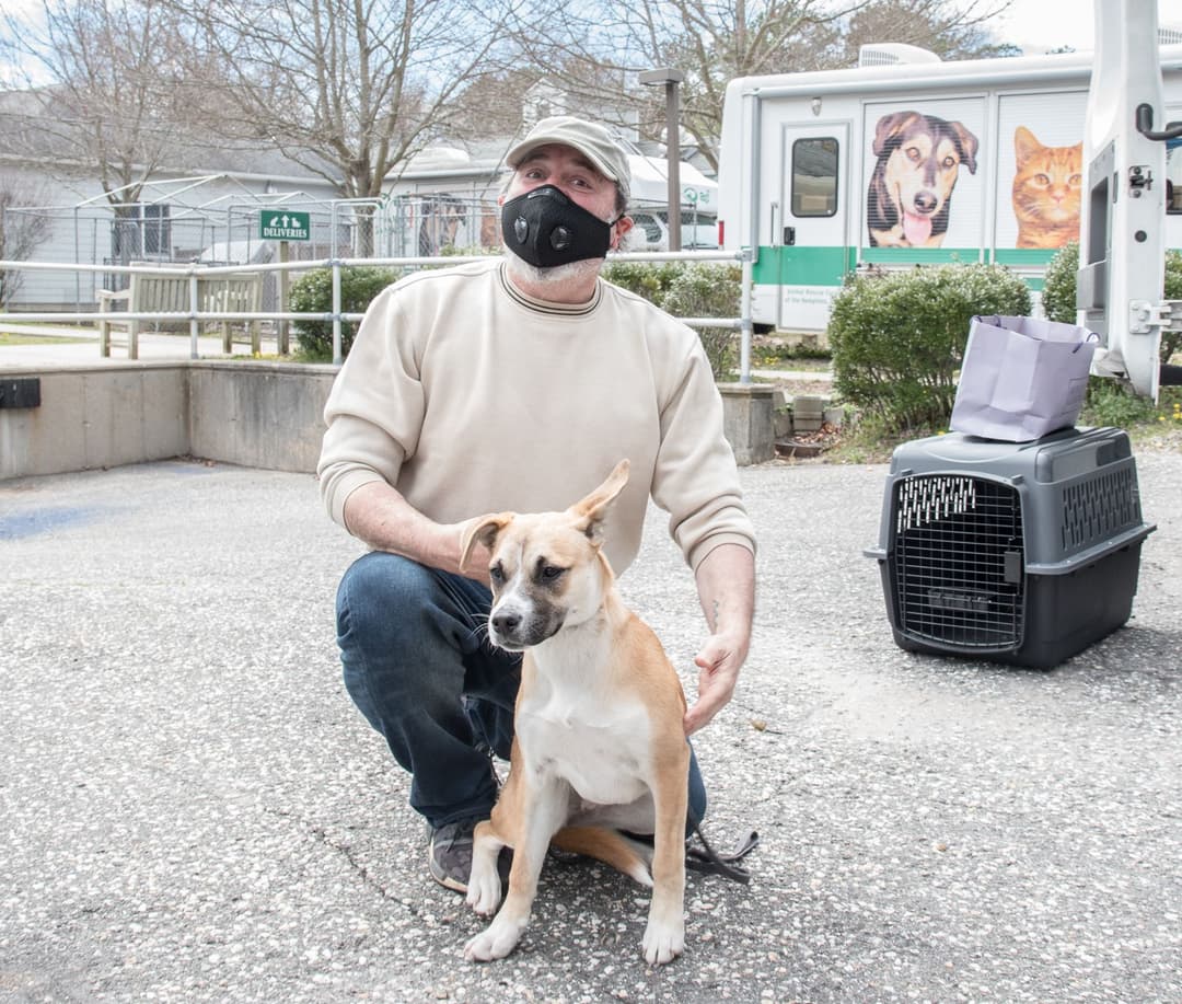Former ARFan Zora stops by to make a donation to the pantry.