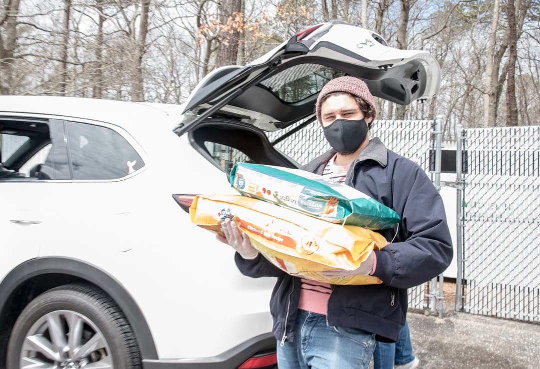 Unloading community donations.