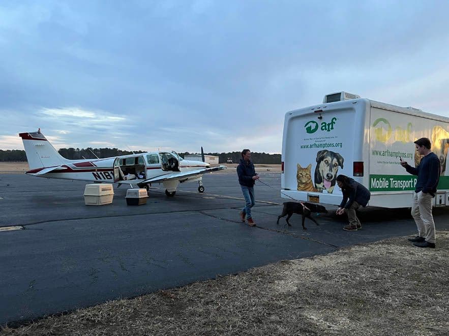 Unloading the plane and loading the ARF van.